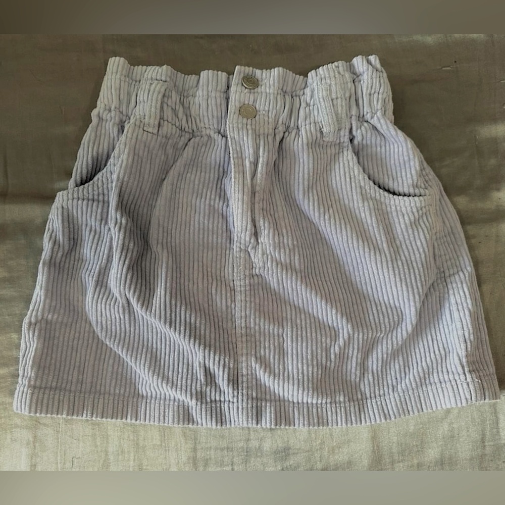 pastel lavender purple textured mini skirt with two buttons